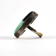 anillo de plata envejecida con piedra doble negra-azul